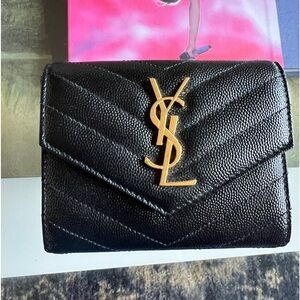SAINT LAURENT
Monogramme leather wallet